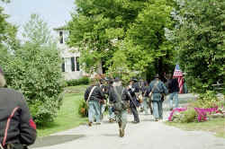 Marching past homes to Federal Hill